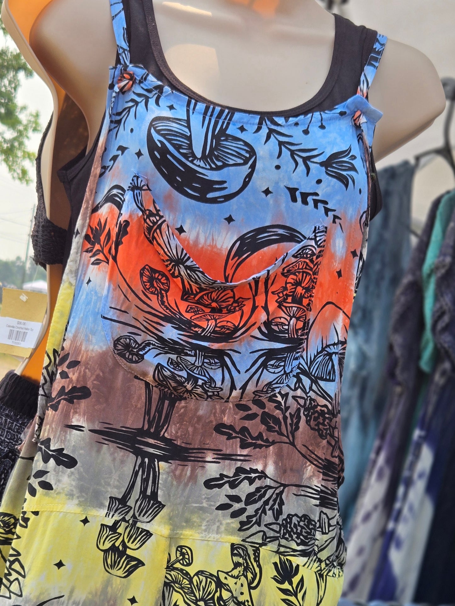 Shortalls with mushroom pattern design on a mannequin
