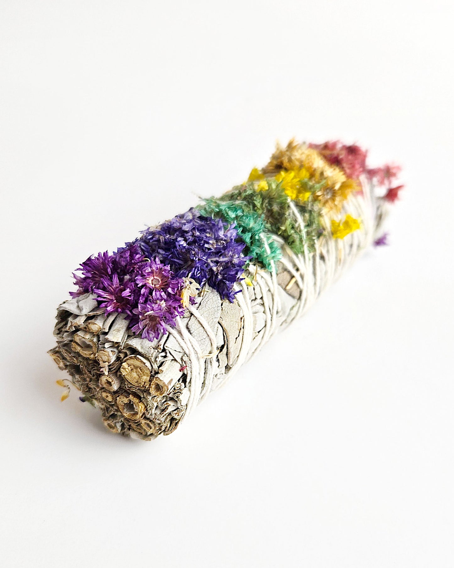 close up of chakra sage smudge stick