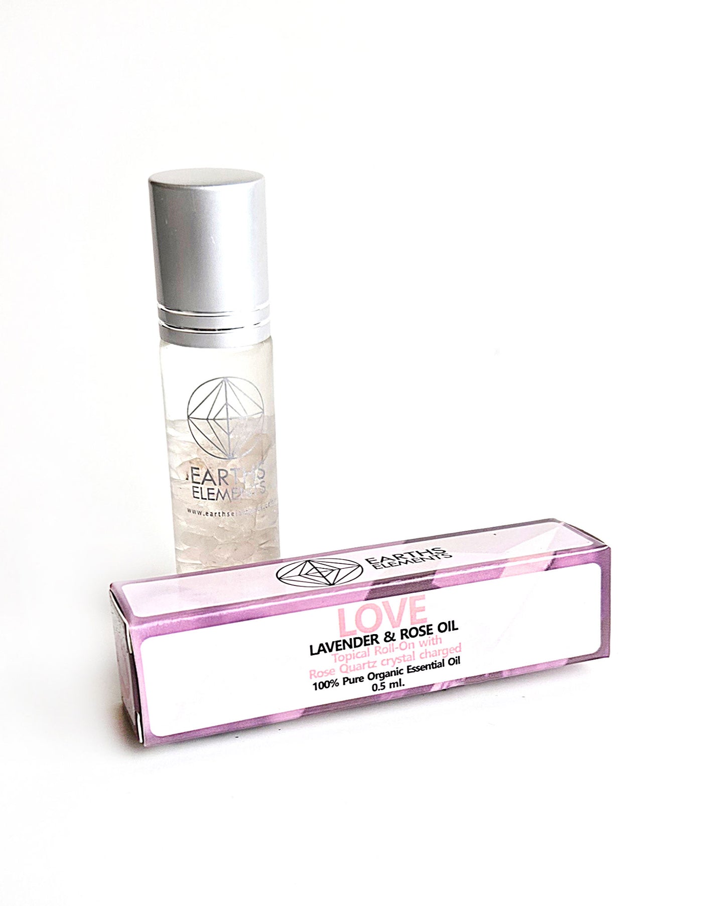organic essential oil blend roll on of lavender and rose with rose quartz crystals