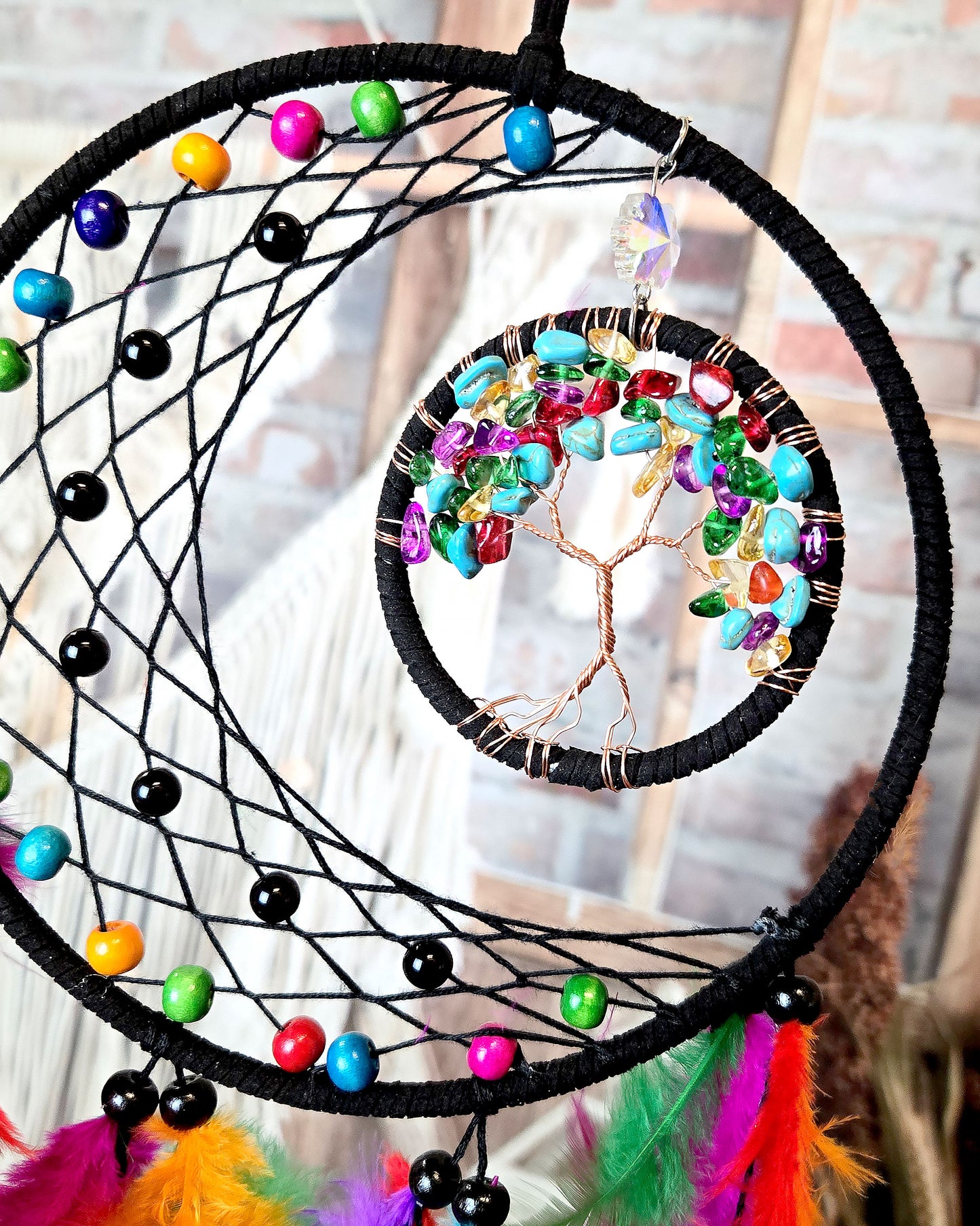 close up of multi color tree of life dream catcher