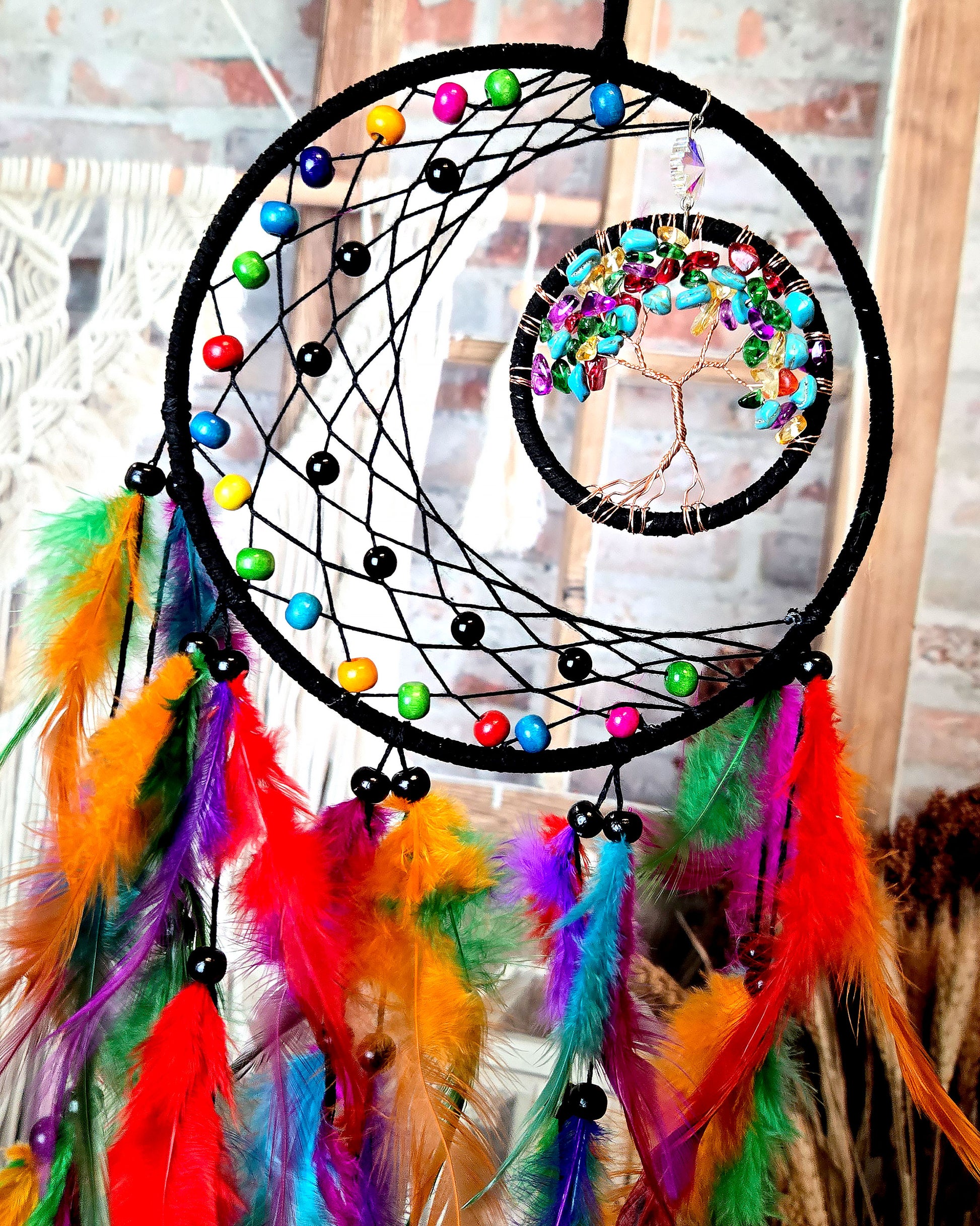 close up of boho home décor multi color tree of life dream catcher