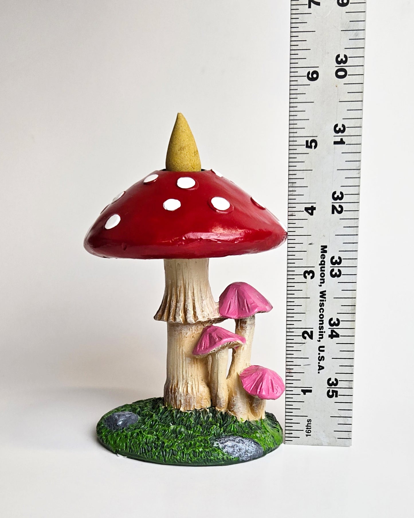 mushroom backflow incense burner with ruler showing height