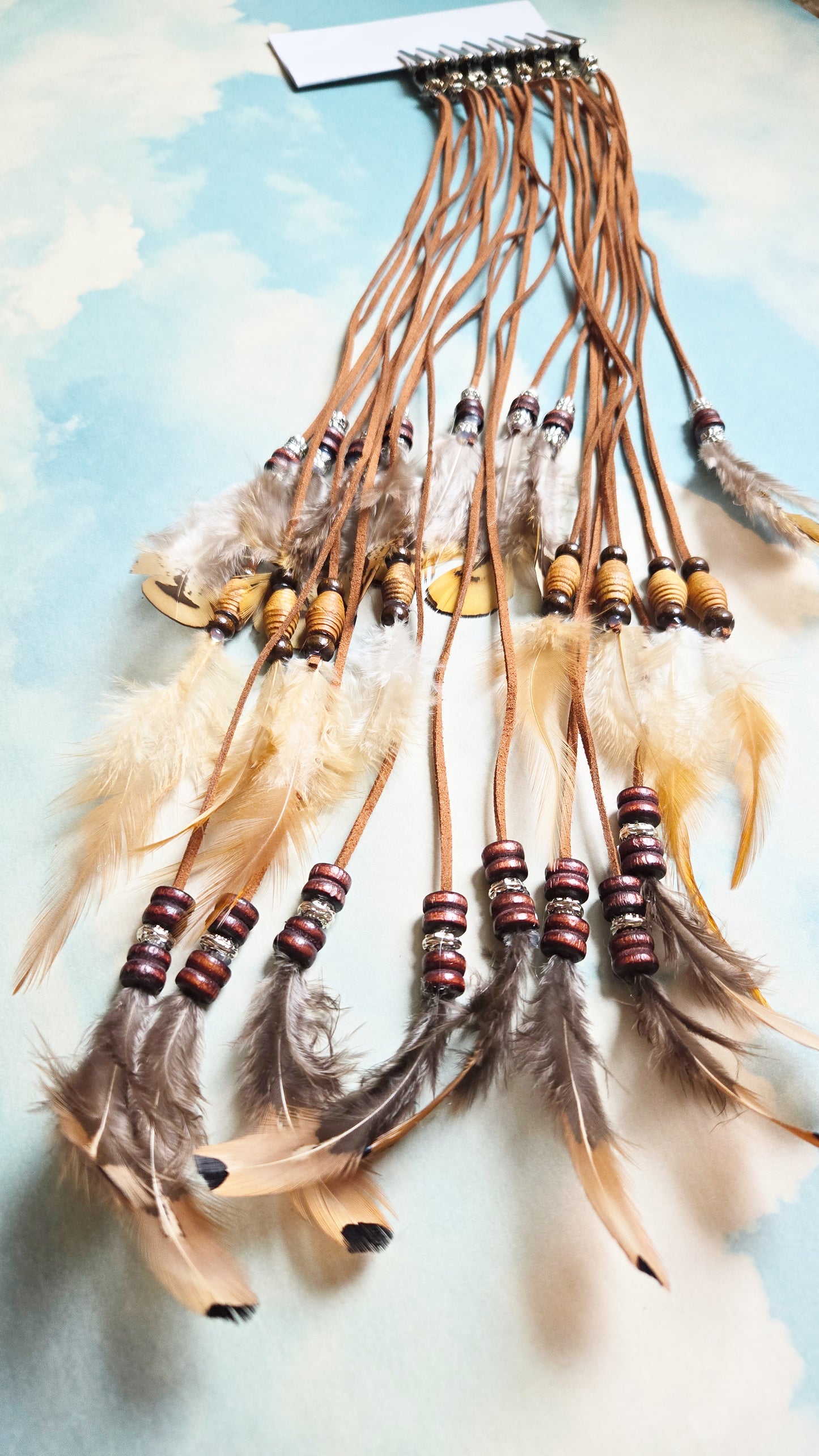 tan feather hair clips
