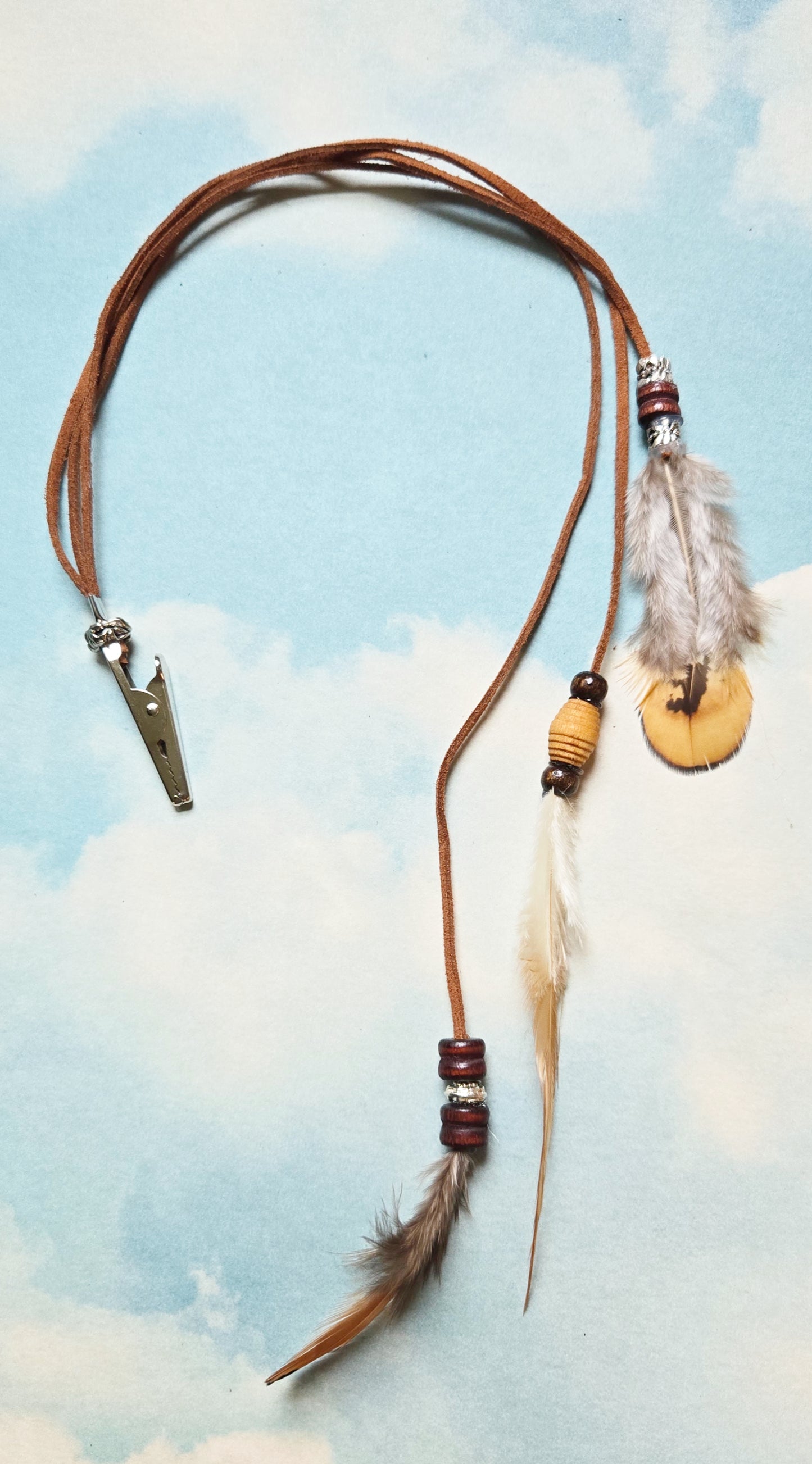 roach clip with feathers