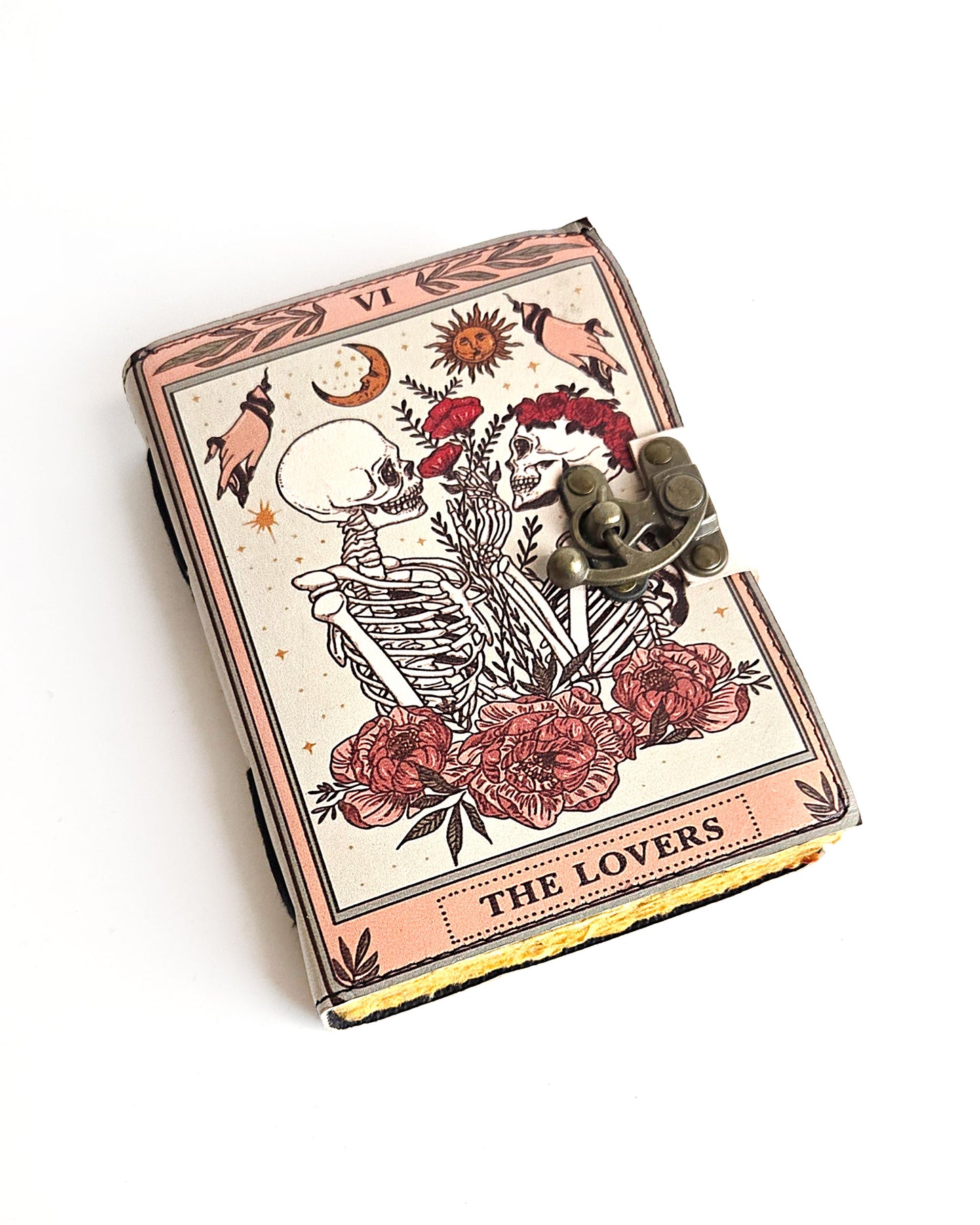 leather journal with the lovers tarot card design antique buckle closure and deckle edge vintage look paper front