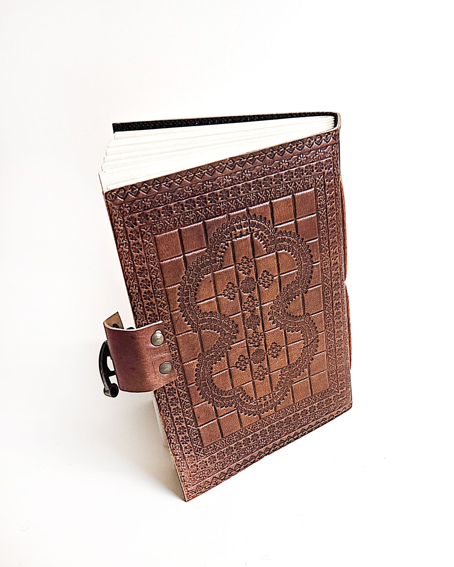 leather journal with embossed turtle design and antique buckle closure top back