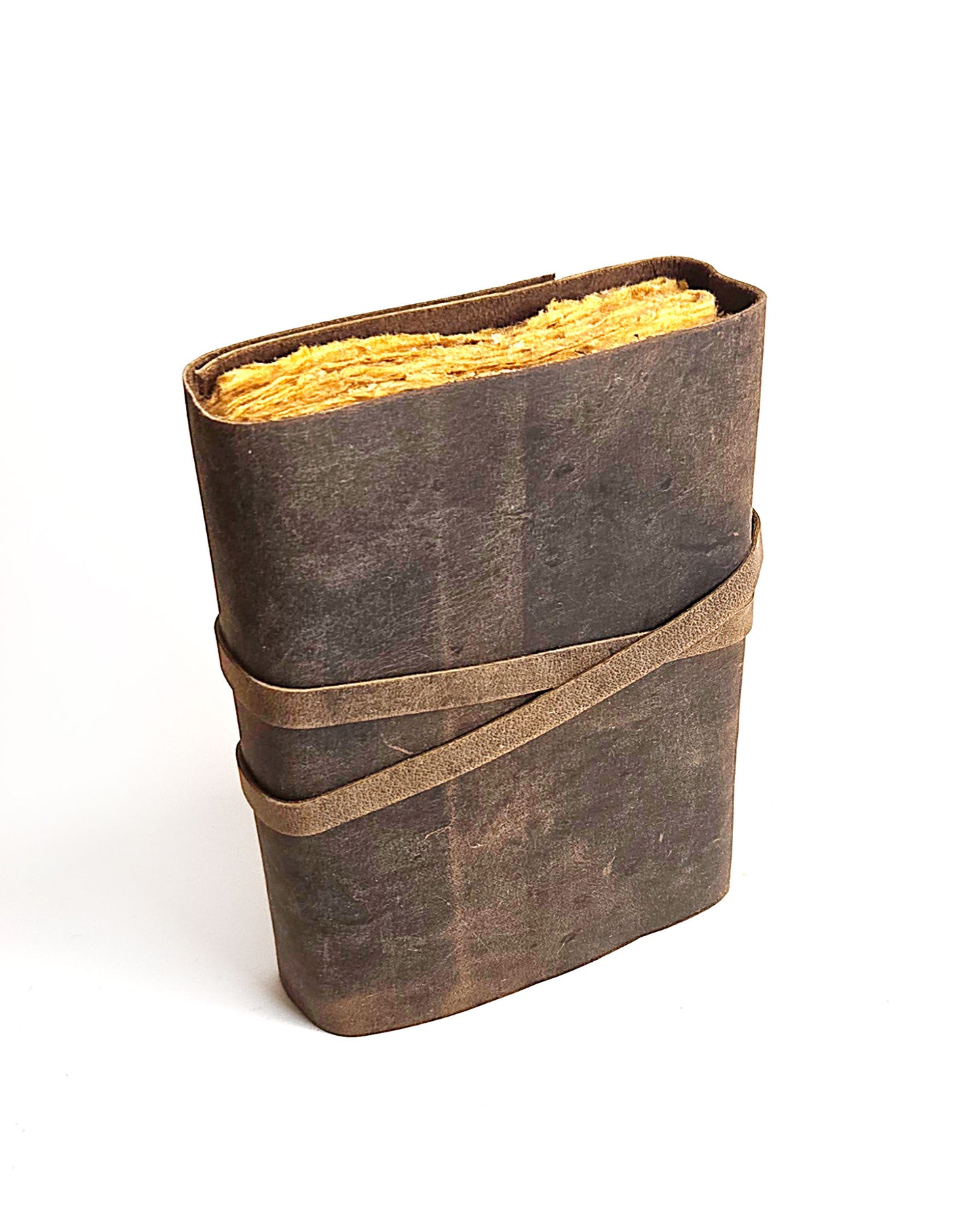 leather journal with a leather strap with decorative antique key closure and deckle edge vintage look paper back view