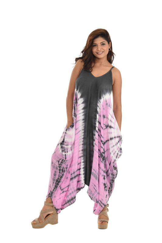 Woman wearing a pink and gray tie-dye jumpsuit on a white background
