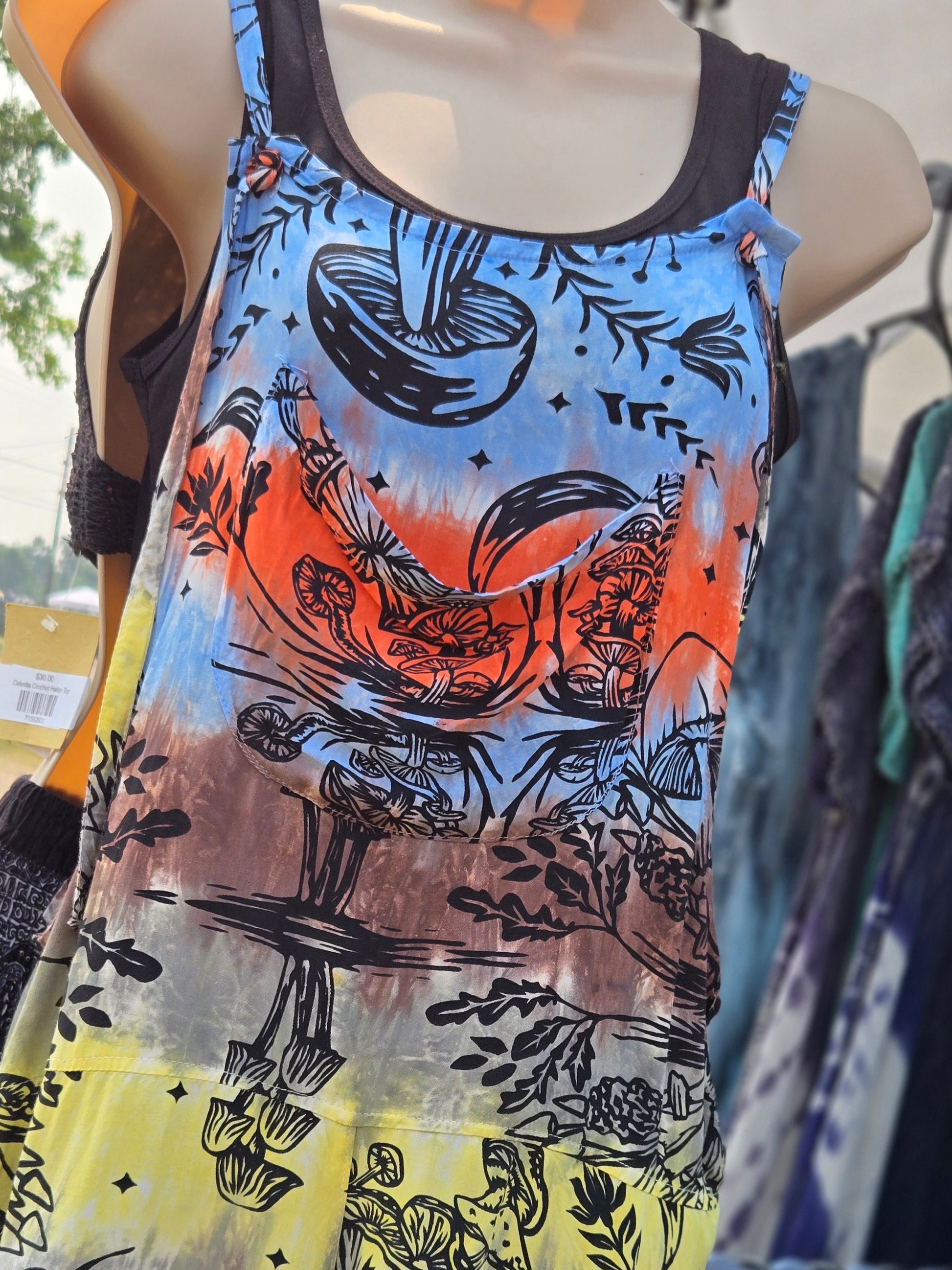 Shortalls with mushroom pattern design on a mannequin