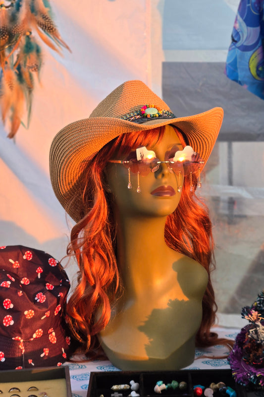 Mannequin head with boho cowboy hat and sunglasses