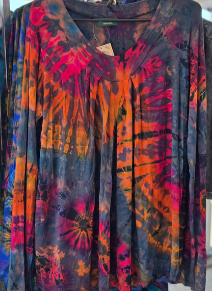 Colorful tie-dye shirt on a rack