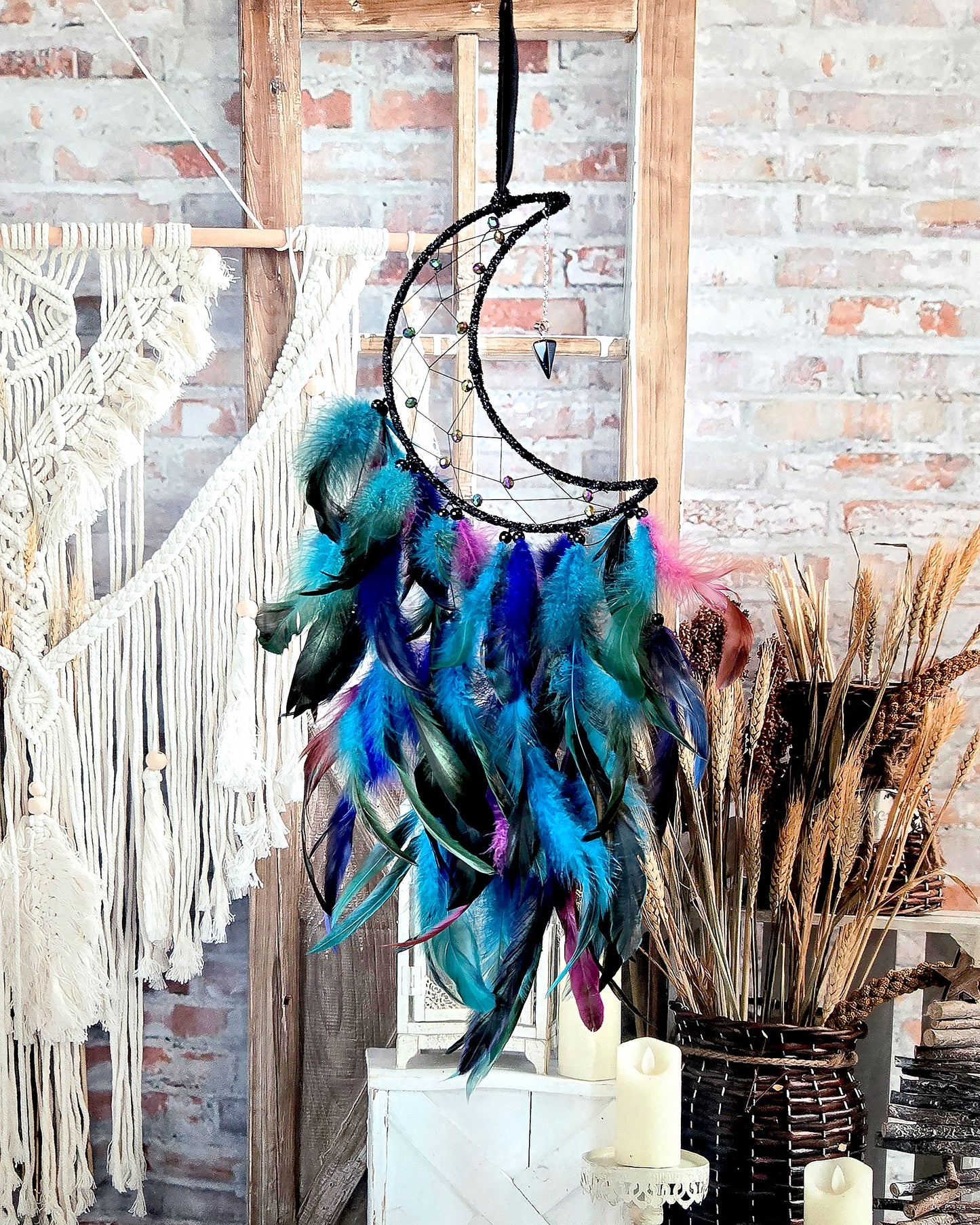 black and blue crescent moon dream catcher with feathers