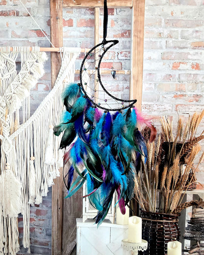 black and blue crescent moon dream catcher with feathers