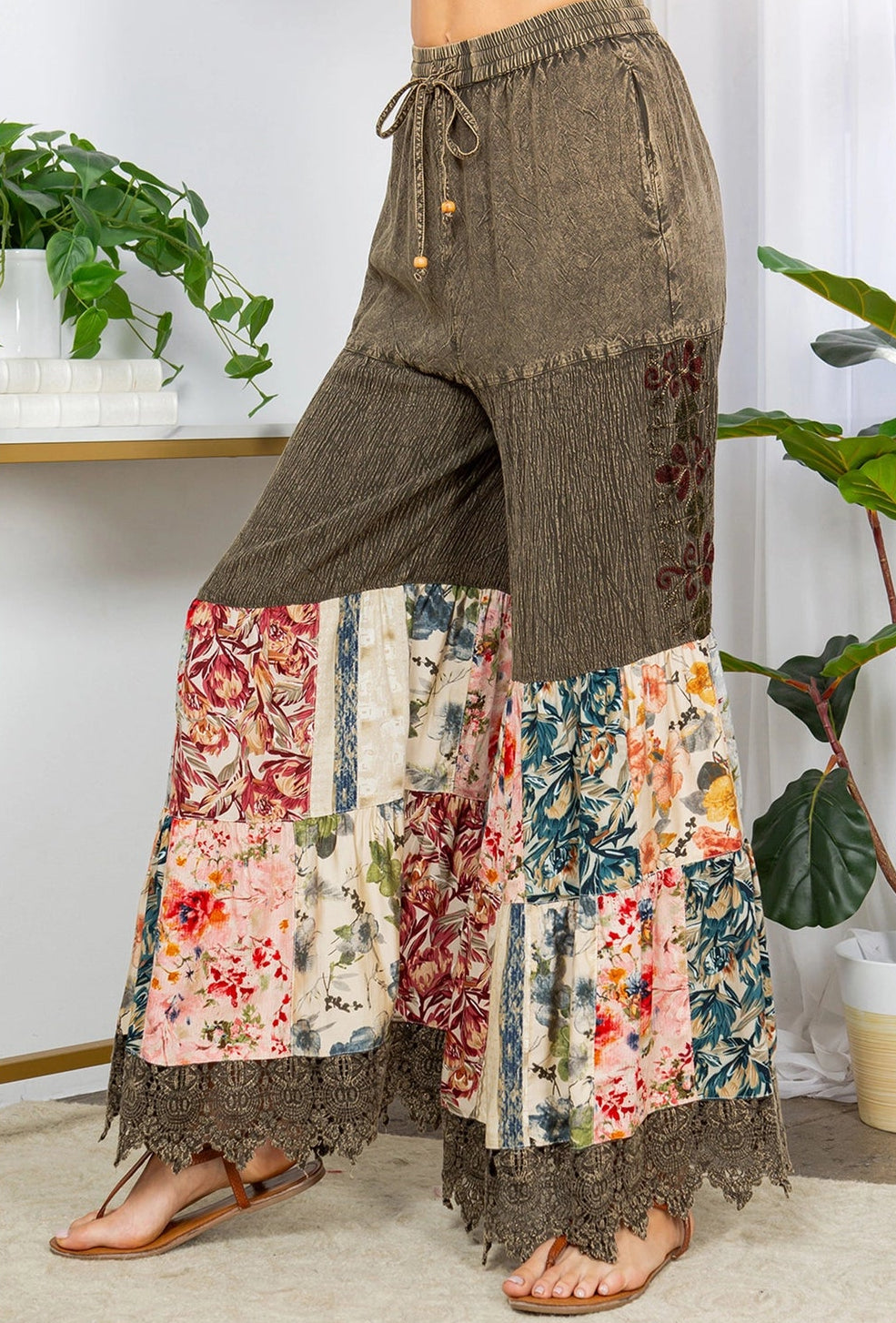 Patchwork floral pants with a plain background