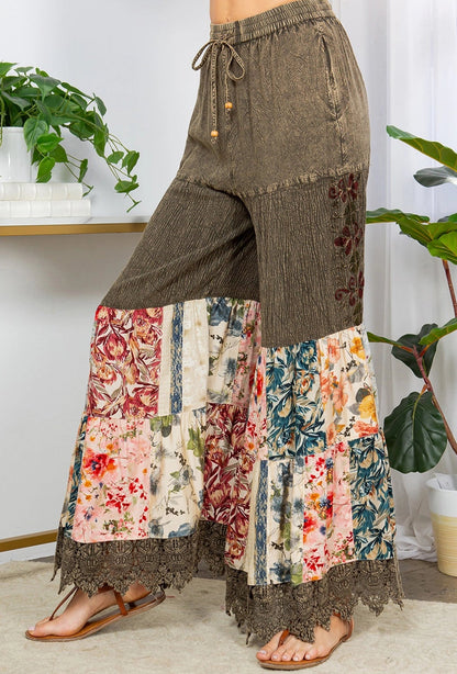 Patchwork floral pants with a plain background