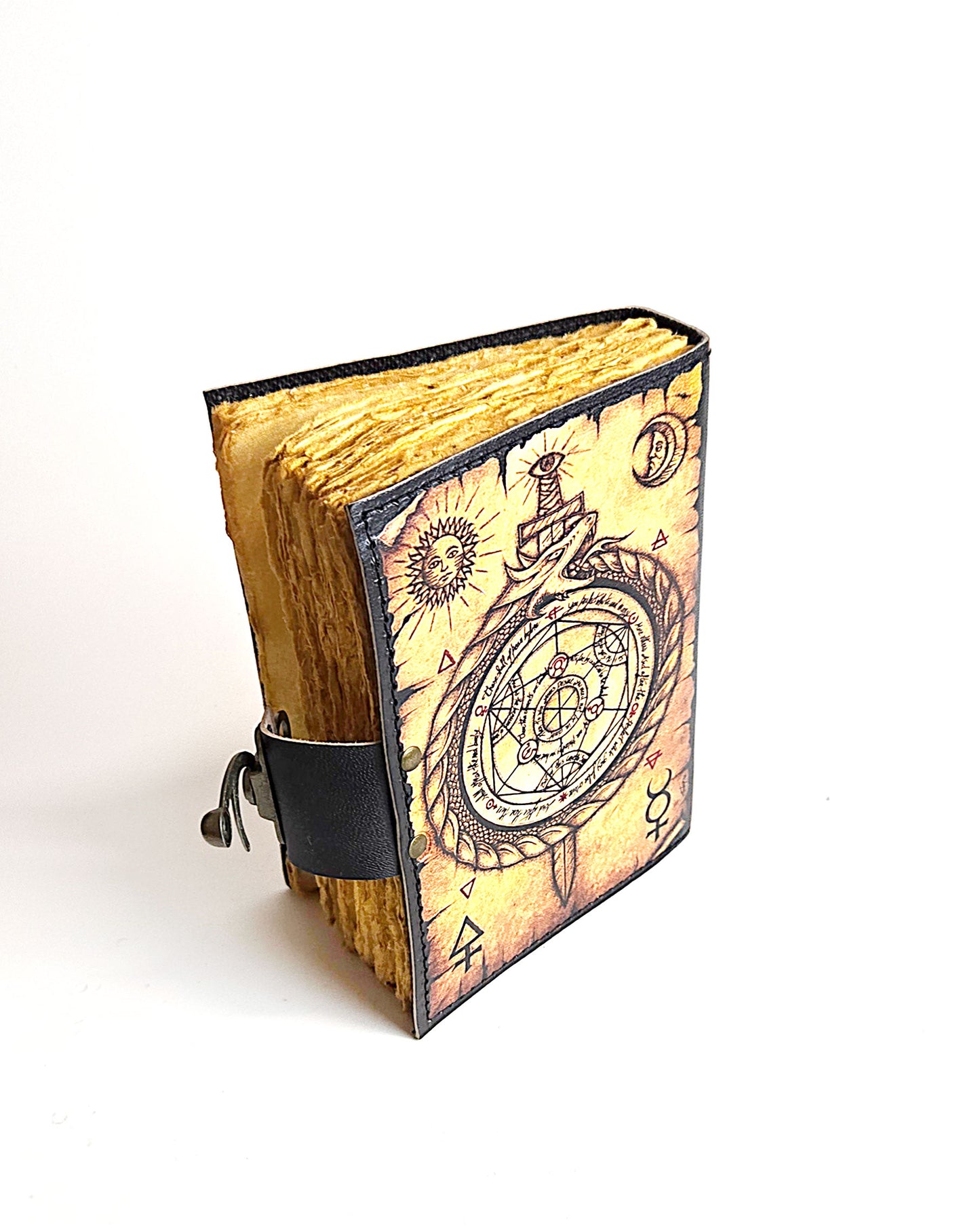top back view of leather journal with compass design antique buckle closure and deckle edge vintage look paper 