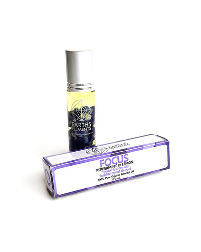 organic essential oil blend roll on of peppermint and lemon with sodalite crystals