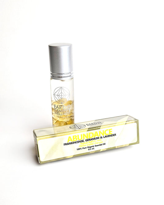 organic essential oil blend roll on of frankincense geranium and lavender in a roll on with citrine crystals