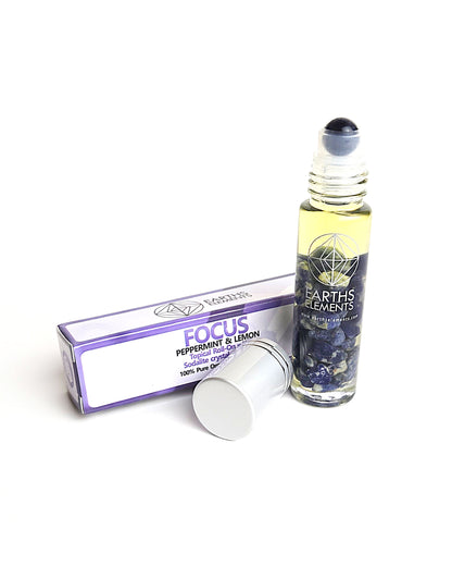 organic essential oil blend roll on of peppermint and lemon with sodalite crystals showing sodalite roller ball