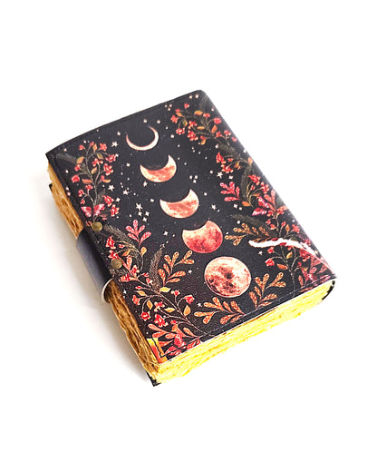 leather journal with moon phases design antique buckle closure and deckle edge vintage look paper back