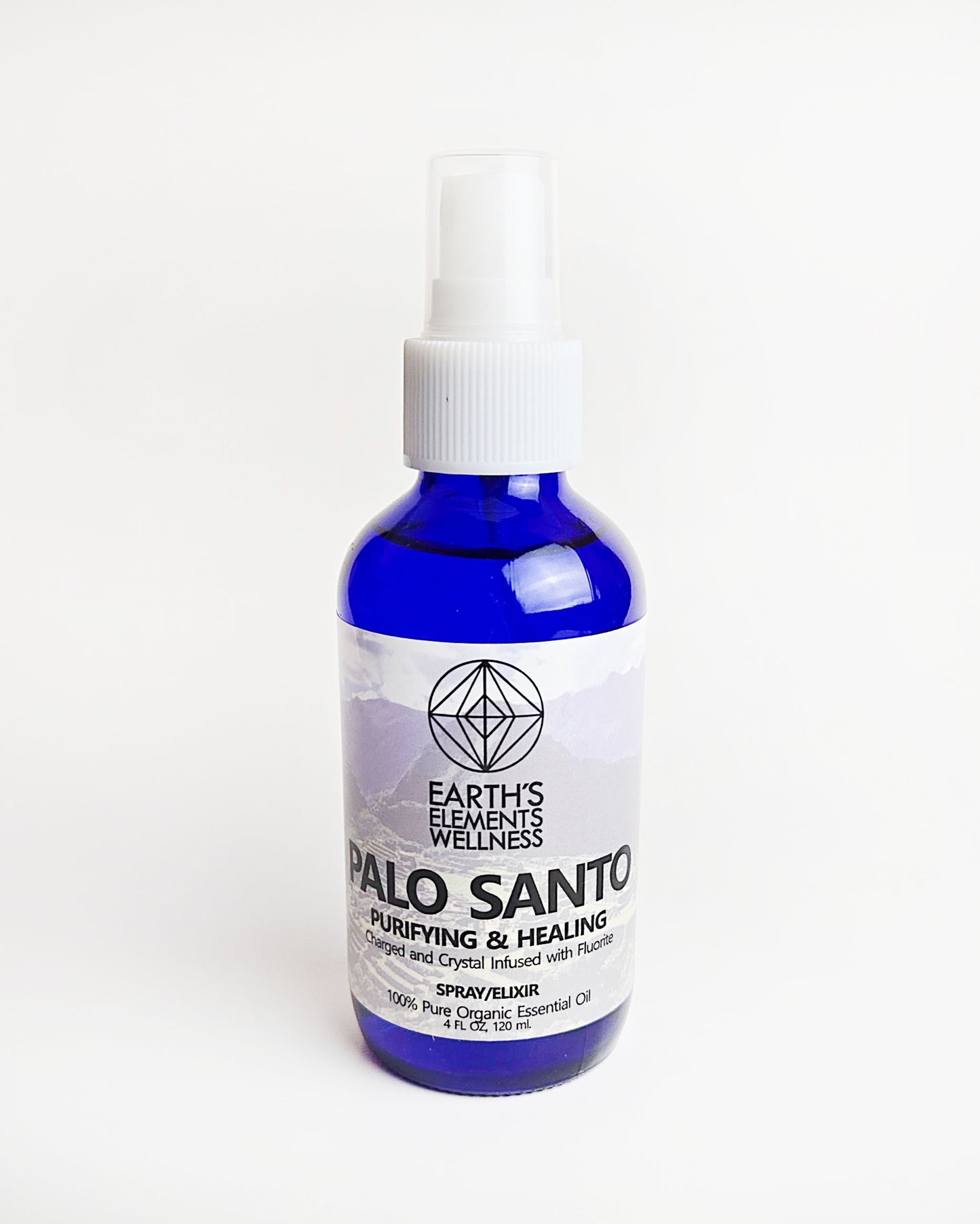 Palo Santo essential oil spray with fluorite crystals front