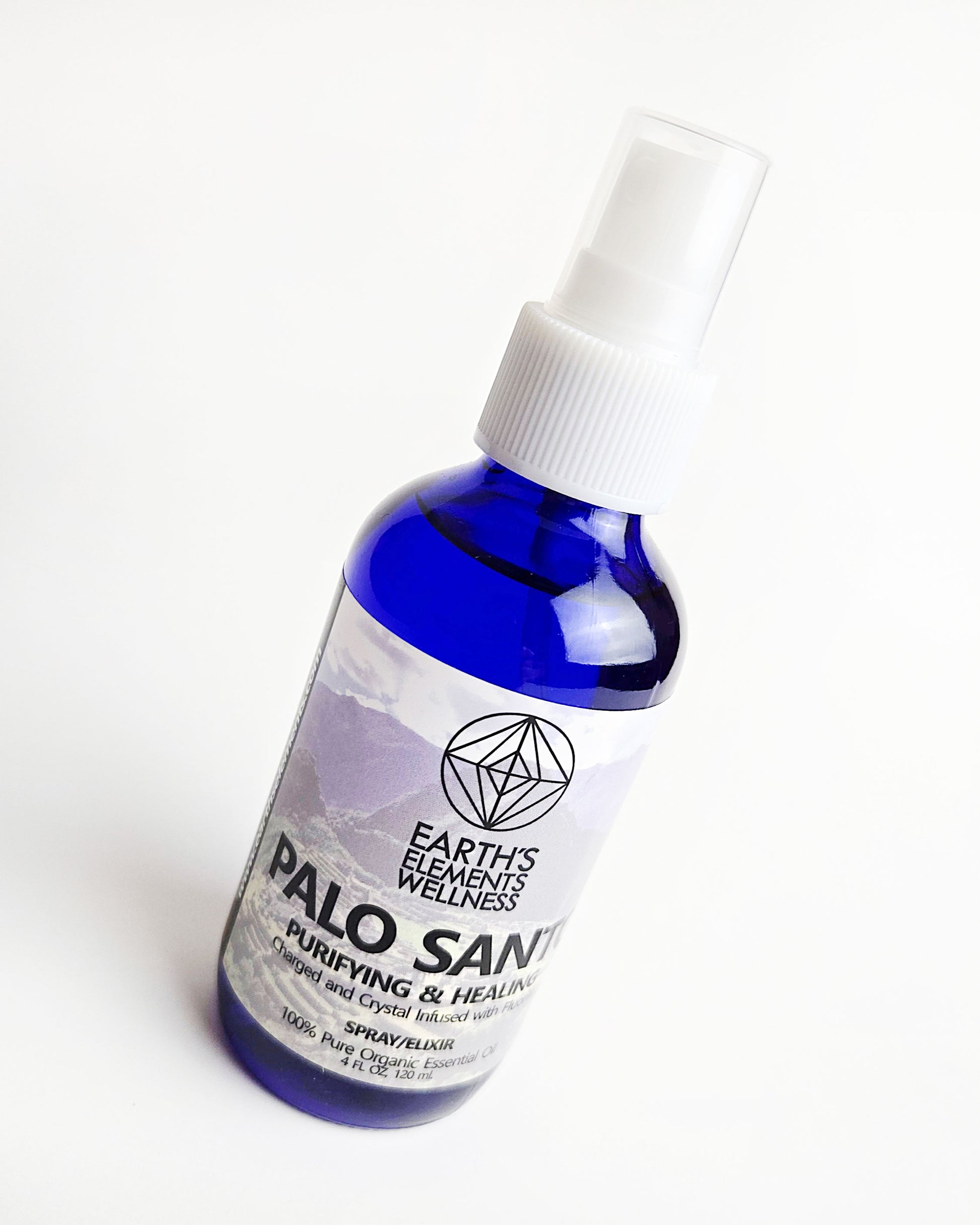 Palo Santo essential oil spray with fluorite crystals