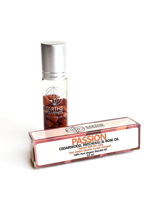 organic essential oil blend roll on of cedarwood patchouli and rose with red jasper crystals