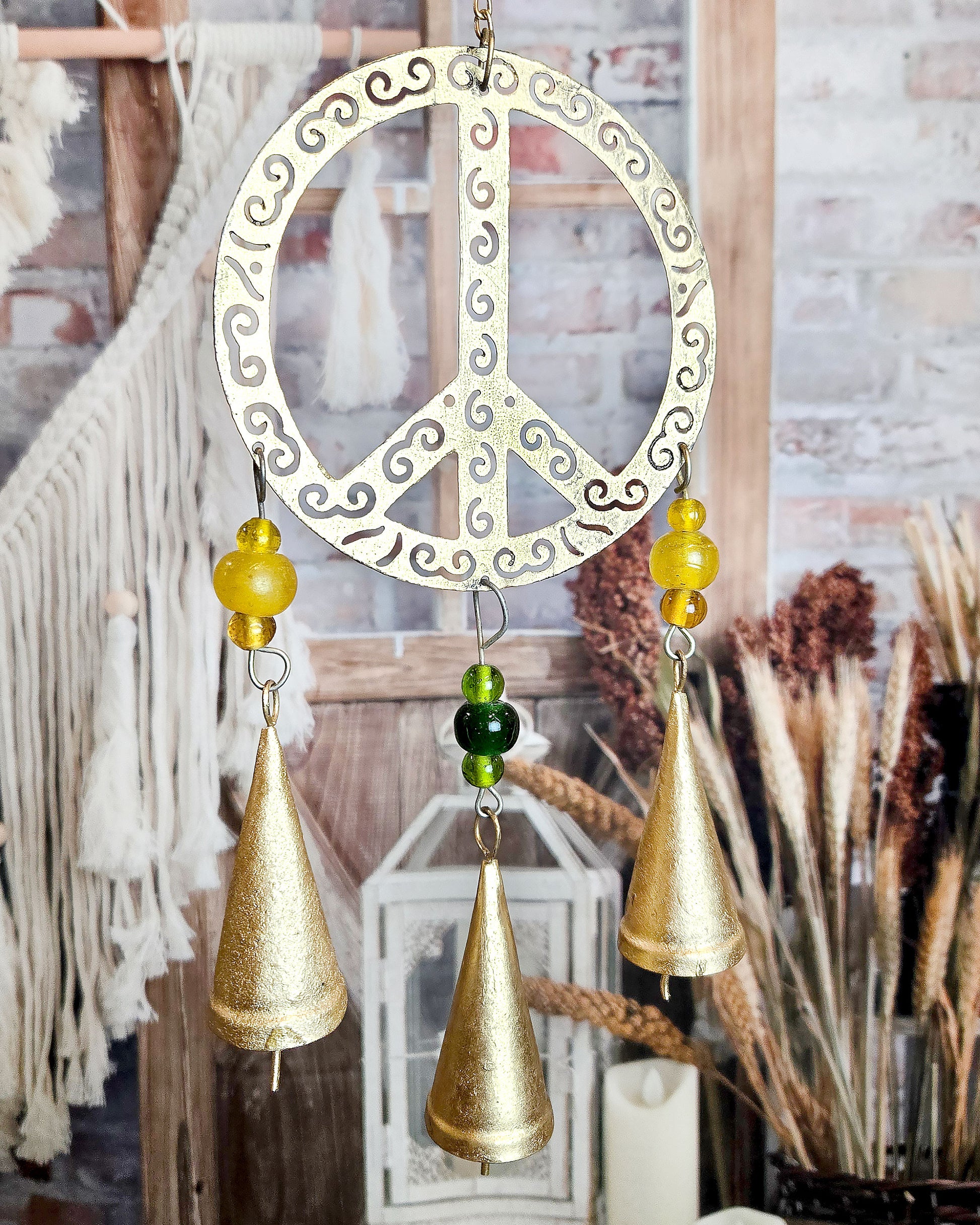 peace sign metal wind chime patio décor close up