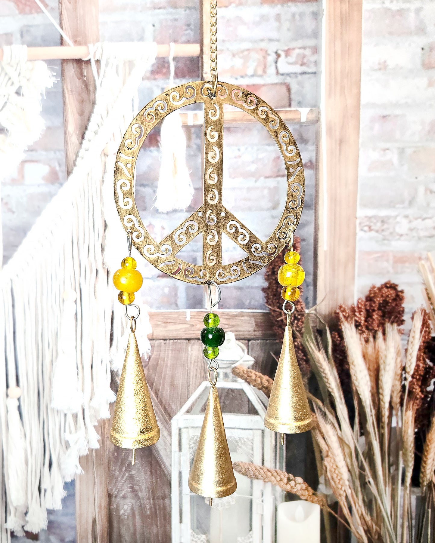 close up of peace sign metal wind for patio and porch décor