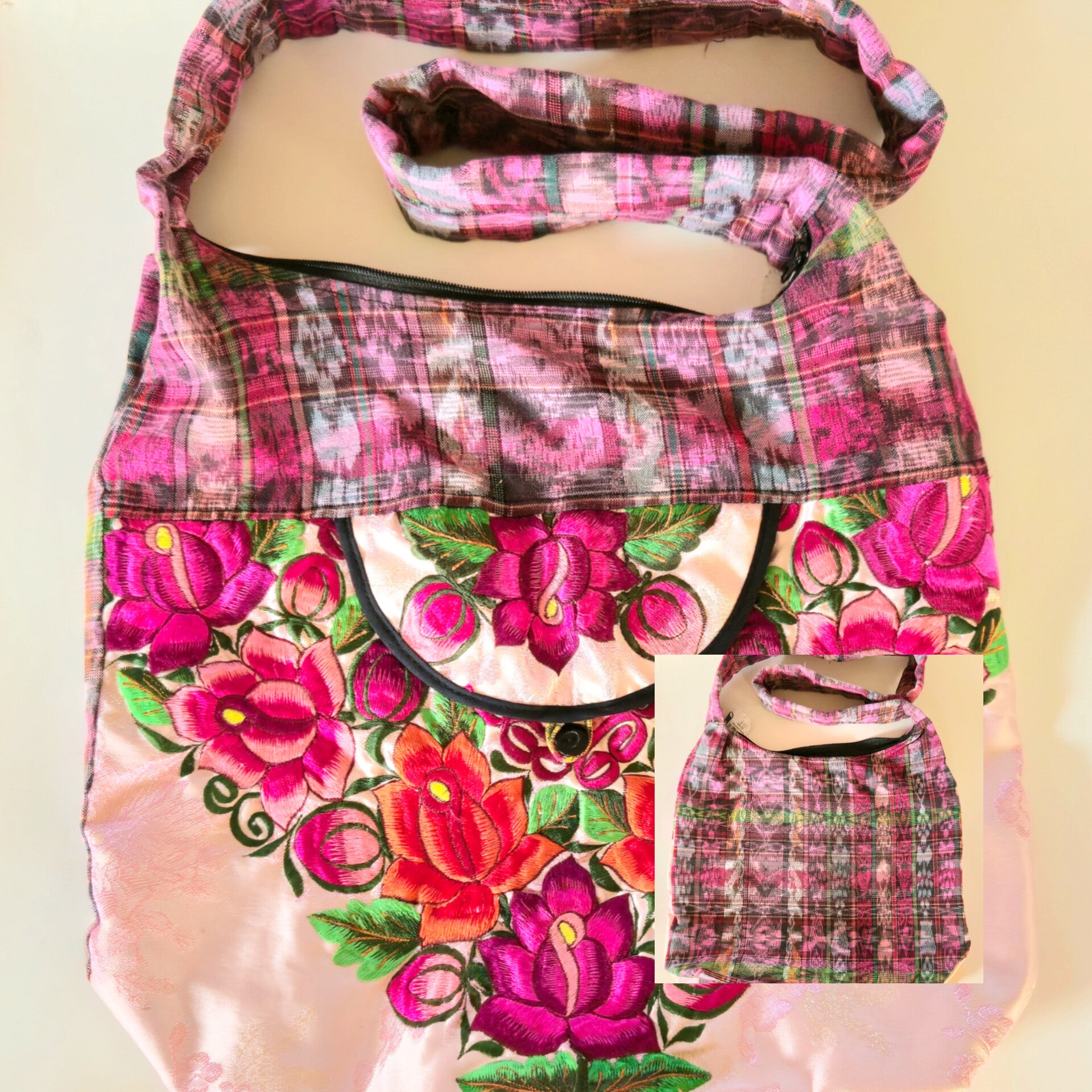 Floral patterned hobo bag with pink flowers on a beige background