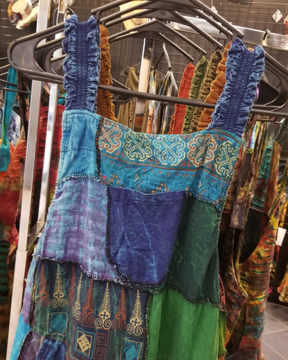 blue wide leg patchwork hippie overalls close up