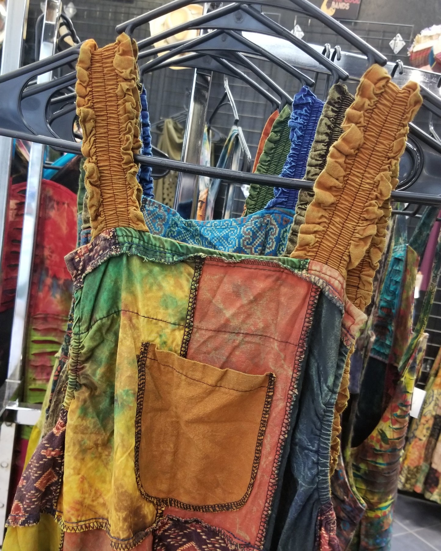 rust wide leg patchwork hippie overalls close up