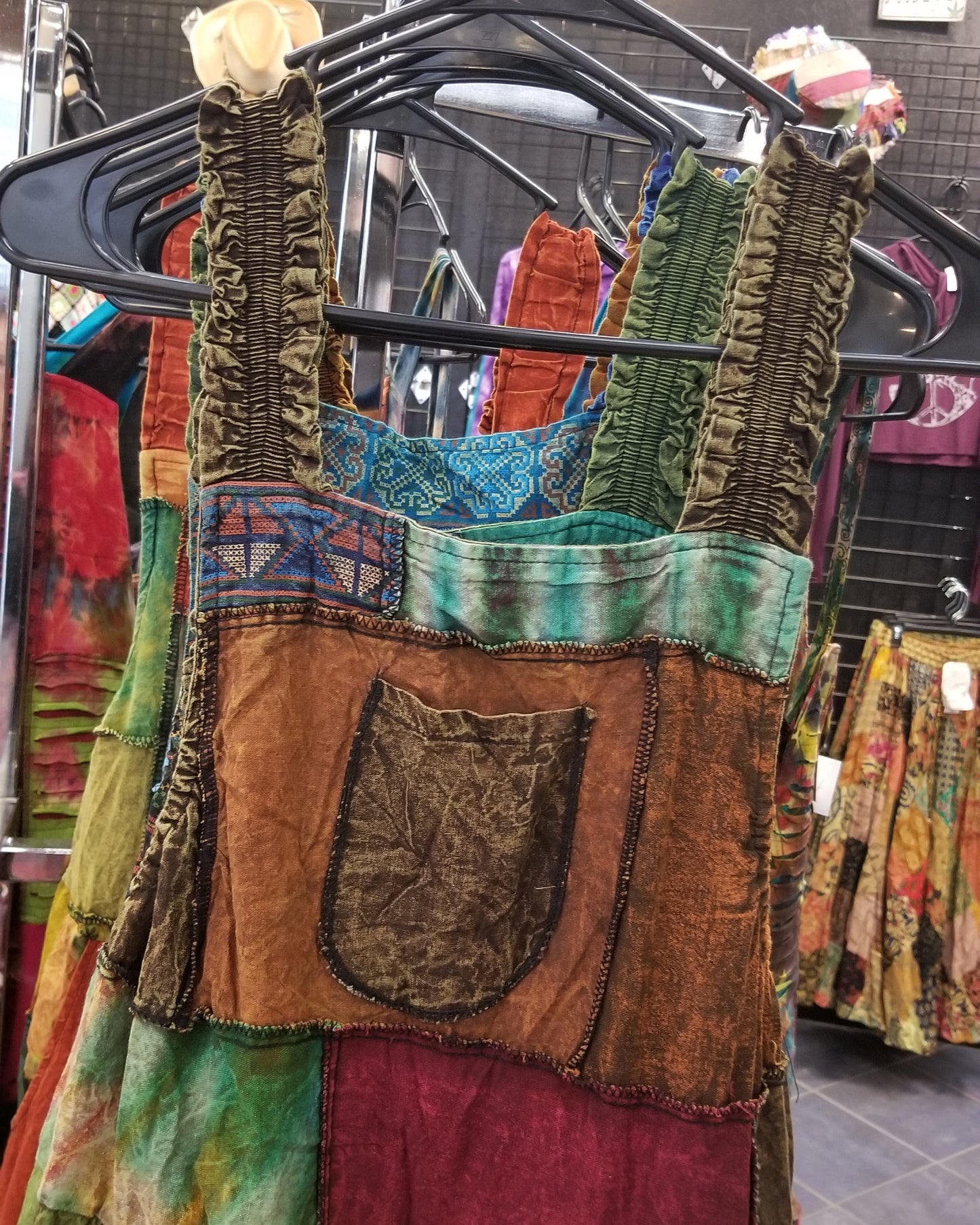 brown wide leg patchwork hippie overalls close up
