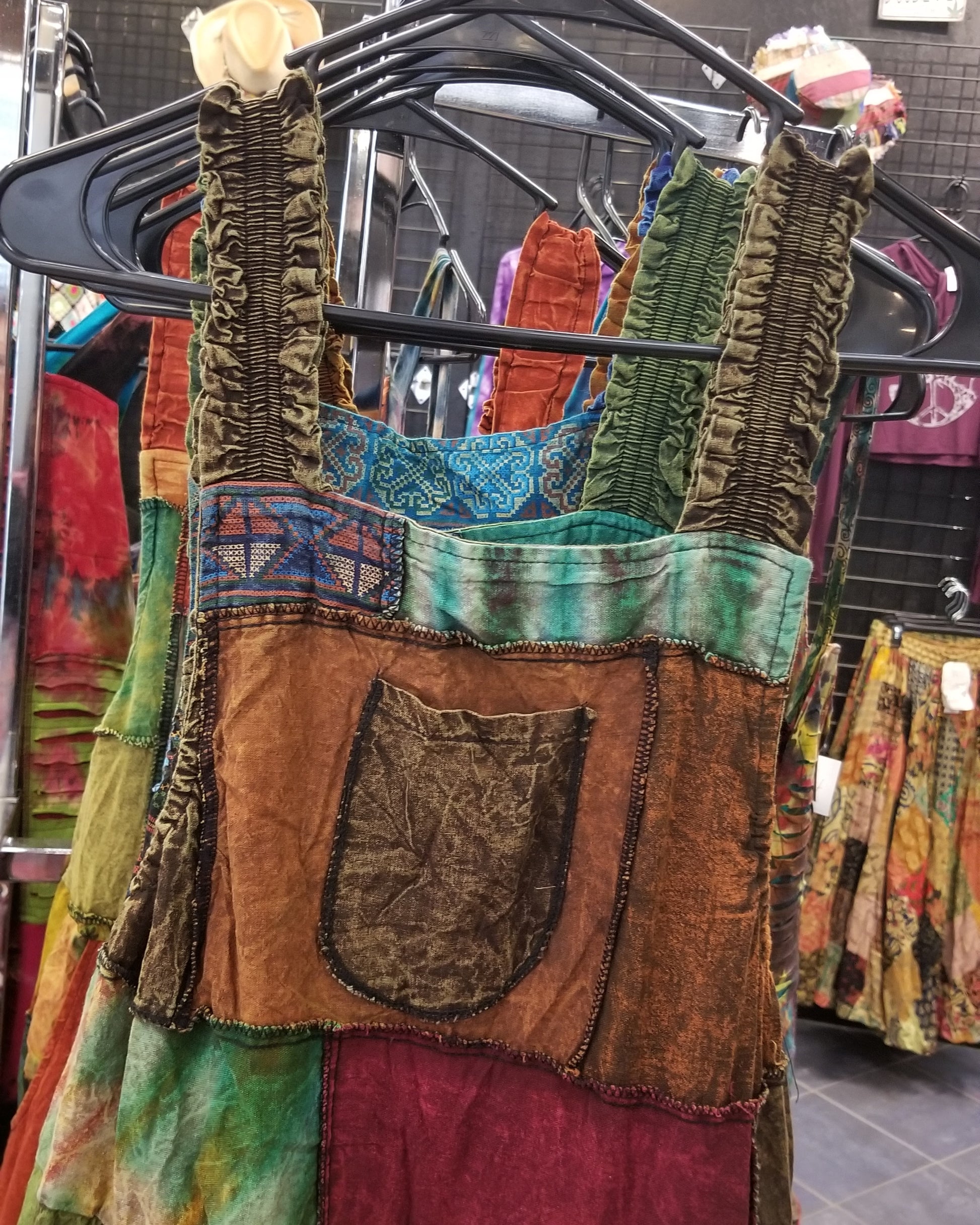 brown wide leg patchwork hippie overalls close up