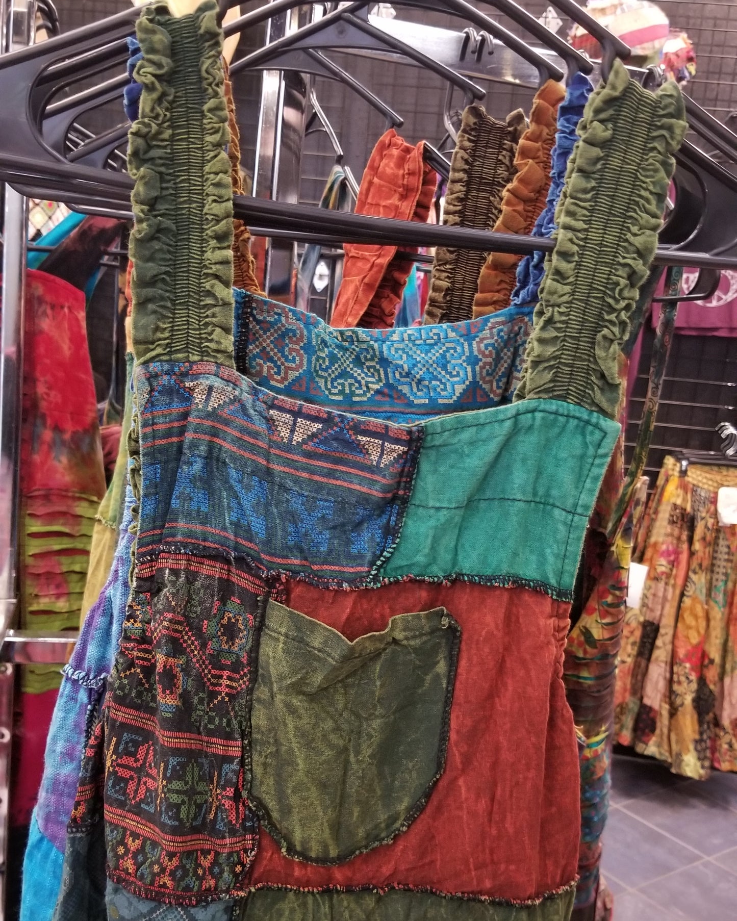 green wide leg patchwork hippie overalls close up
